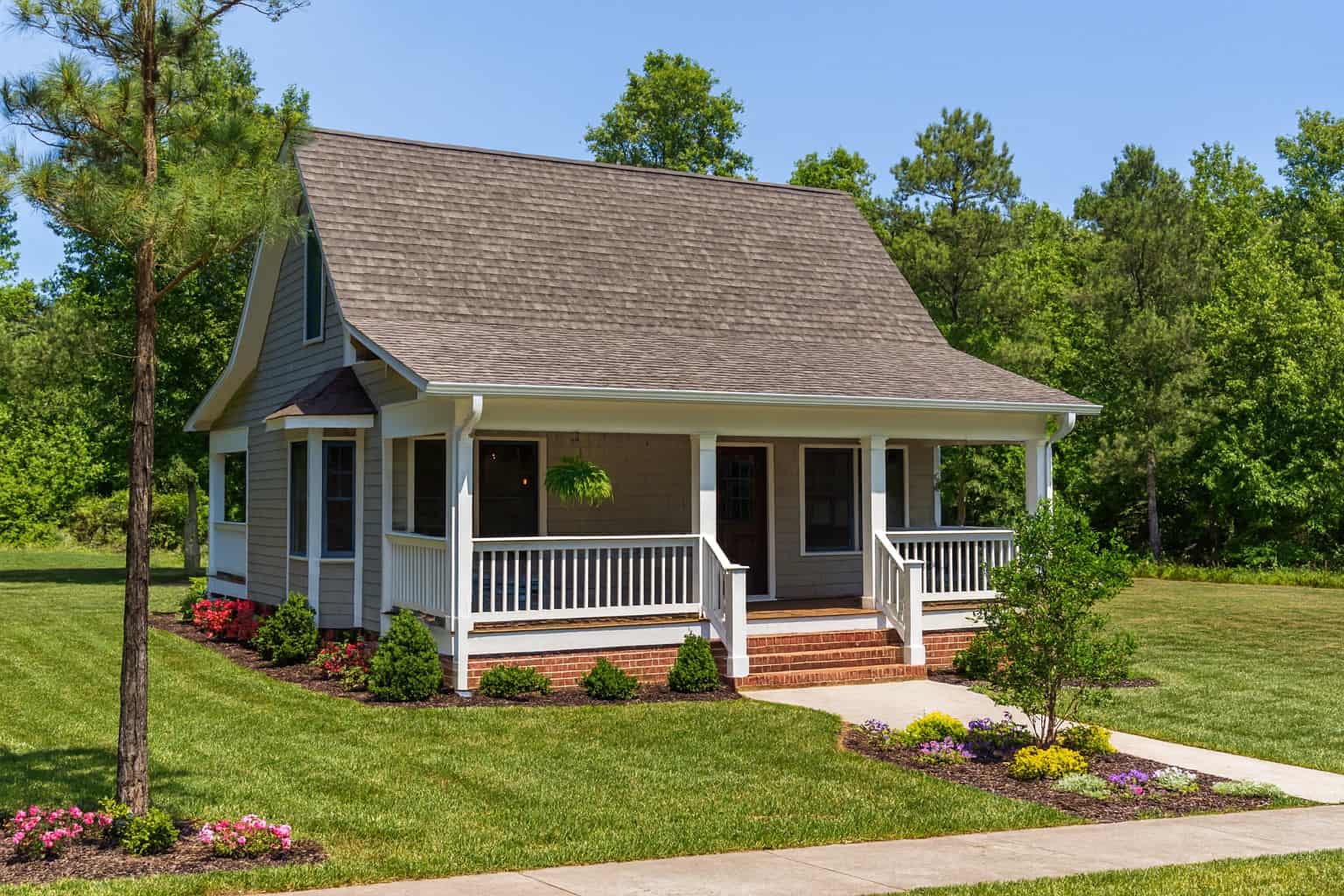 Front elevation of Multi-Level home (ThePlanCollection: House Plan #153-1702)