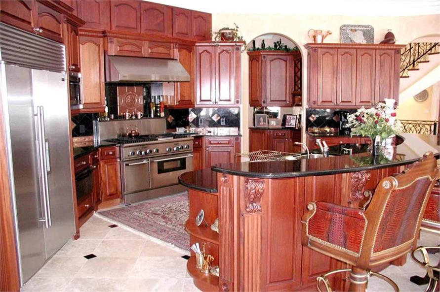 Kitchen: Breakfast Bar of this 6-Bedroom,8210 Sq Ft Plan -106-1206