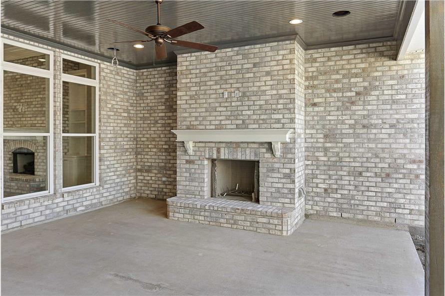 Home Exterior Fireplace Photograph of this 4-Bedroom,2851 Sq Ft Plan -206-1073